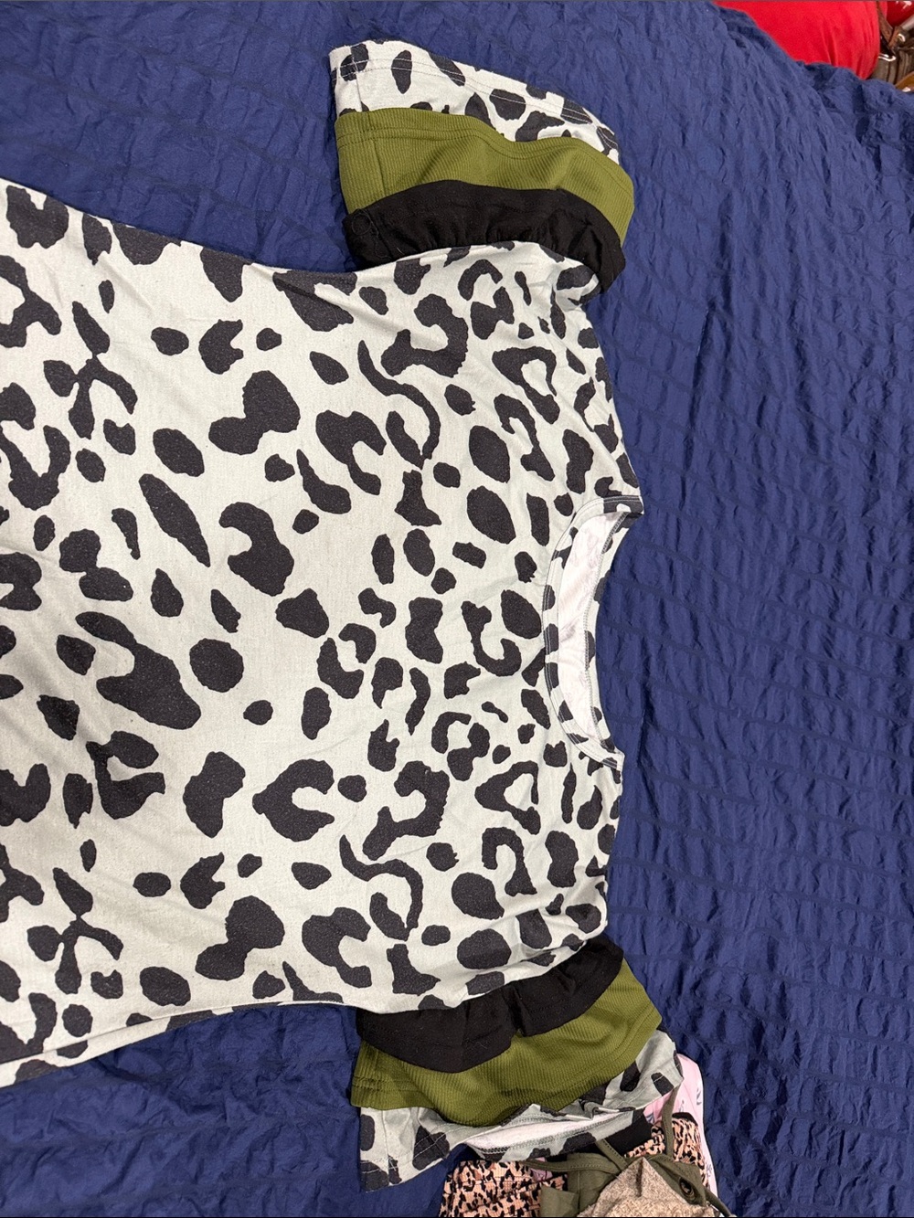 Black and White Animal Print Top with Olive Accent Sleeves